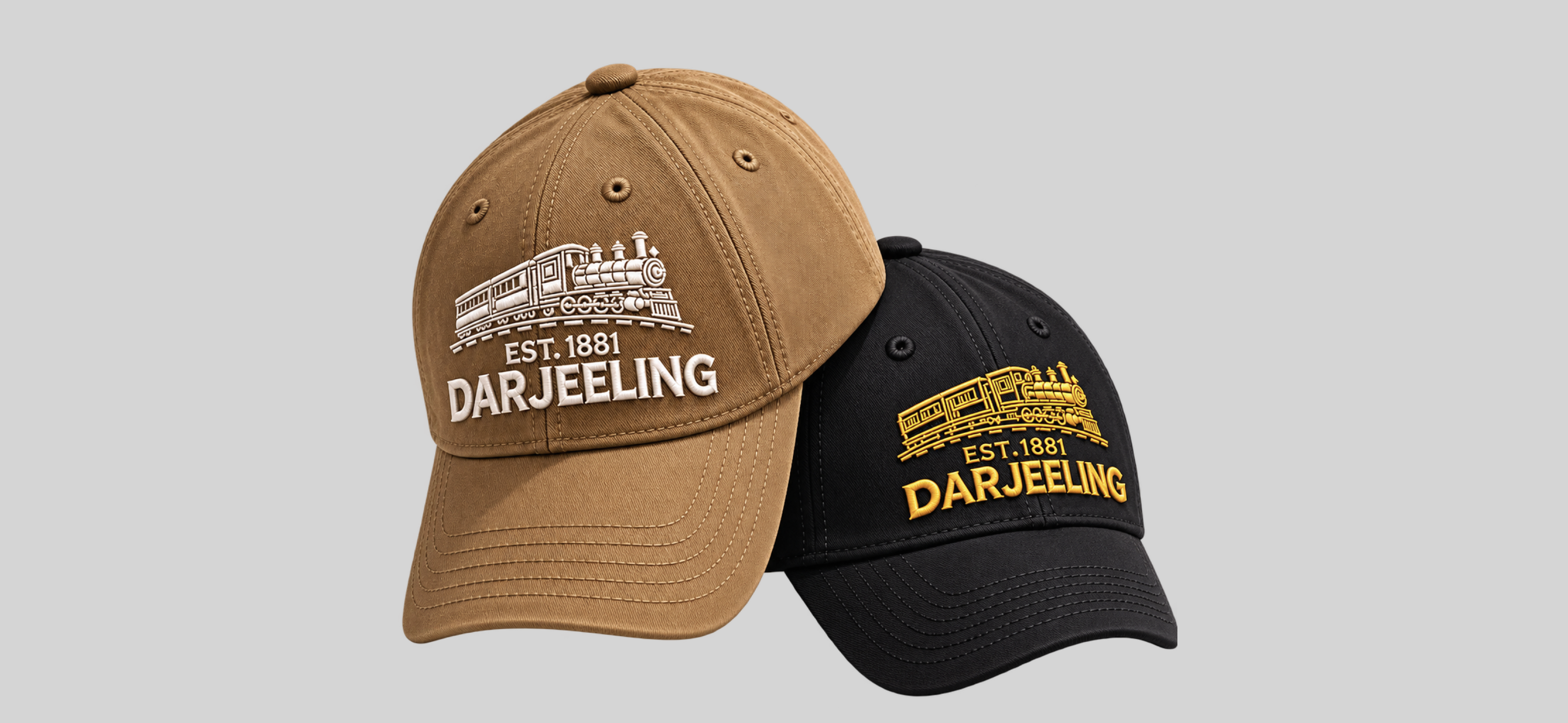 Khaki and Black caps with embroidered Darjeeling Toy Train designs